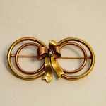 Tiffany & Co. 1940s-50s 14K Yellow Rose and White Gold Bow Pin with Diamond